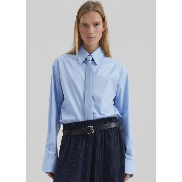 The Frankie Shop Peri Cotton Shirt - Light Blue - Oversized Minimalist Tops in Blue - Shop at Luxury Shoes 