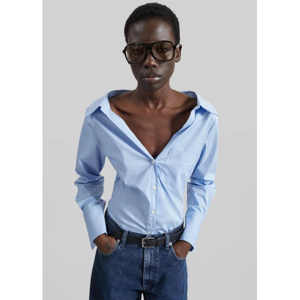 The Frankie Shop Tiona Fitted Shirt - Light Blue - Oversized Minimalist Tops in Blue - Shop at Luxury Shoes 