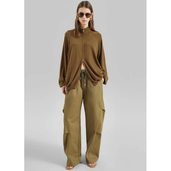The Frankie Shop Tulsa Curved Pants - Dark Olive - Oversized Minimalist Pants in Green - Shop at Luxury Shoes 