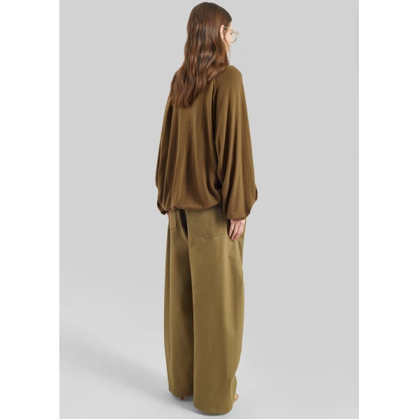 The Frankie Shop Tulsa Curved Pants - Dark Olive - Oversized Minimalist Pants in Green - Shop at Luxury Shoes 