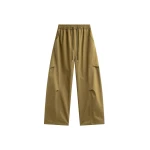 The Frankie Shop Tulsa Curved Pants - Dark Olive - Oversized Minimalist Pants in Green - Shop at Luxury Shoes 