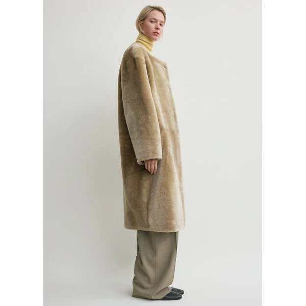 Totême Collarless Shearling Coat Rye - Coats - Scandinavian Minimalist Luxury at Luxury Shoes 