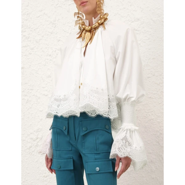 Elevate your elegance in this Zimmermann Tops available now at Luxury Shoes 