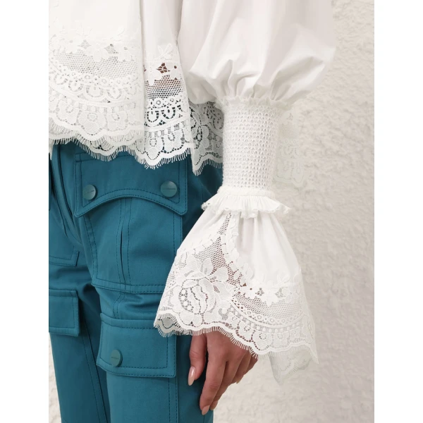 Elevate your elegance in this Zimmermann Tops available now at Luxury Shoes 