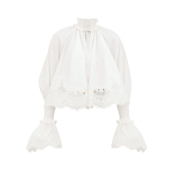 Elevate your elegance in this Zimmermann Tops available now at Luxury Shoes 