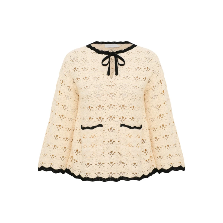 Elevate your elegance in this Zimmermann Tops available now at Luxury Shoes 