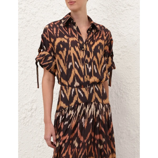 Elevate your elegance in this Zimmermann Tops available now at Luxury Shoes 