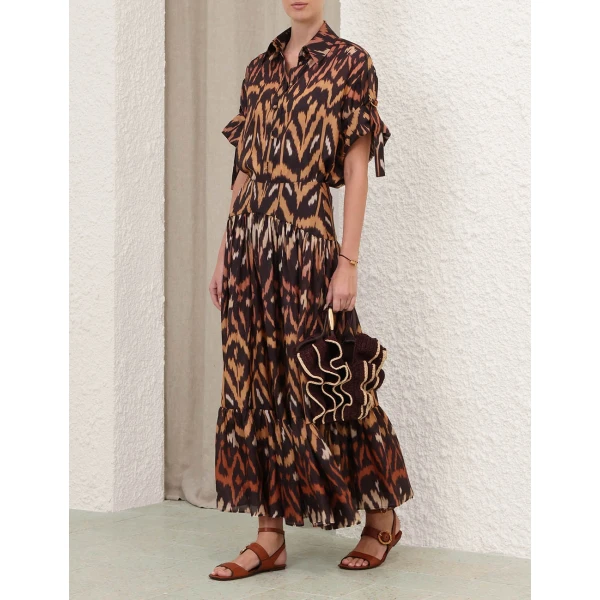 Elevate your elegance in this Zimmermann Tops available now at Luxury Shoes 