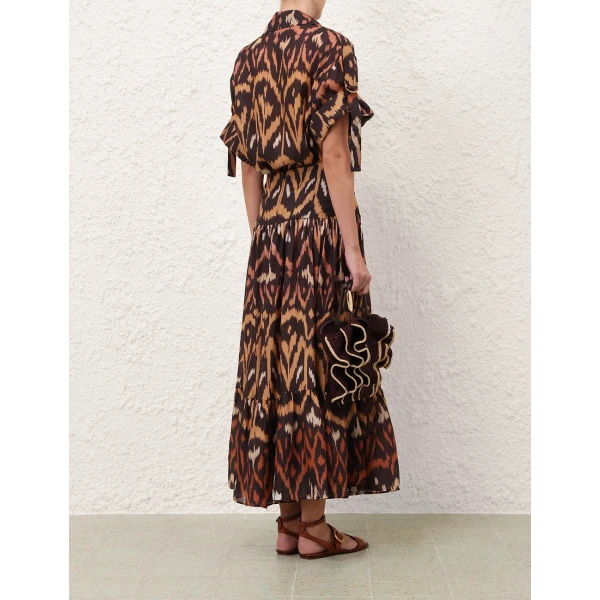 Elevate your elegance in this Zimmermann Tops available now at Luxury Shoes 