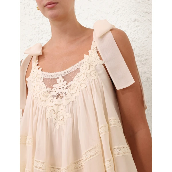 Elevate your elegance in this Zimmermann Tops available now at Luxury Shoes 