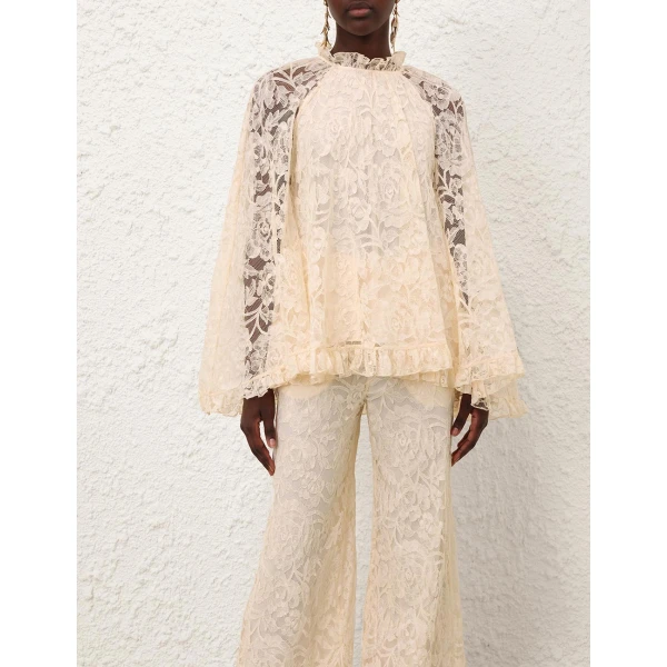 Elevate your elegance in this Zimmermann Tops available now at Luxury Shoes 