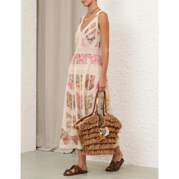 Elevate your elegance in this Zimmermann Dresses available now at Luxury Shoes 