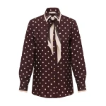 Elevate your elegance in this Zimmermann Tops available now at Luxury Shoes 