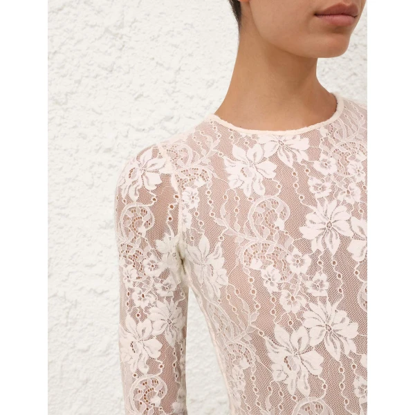 Elevate your elegance in this Zimmermann Tops available now at Luxury Shoes 