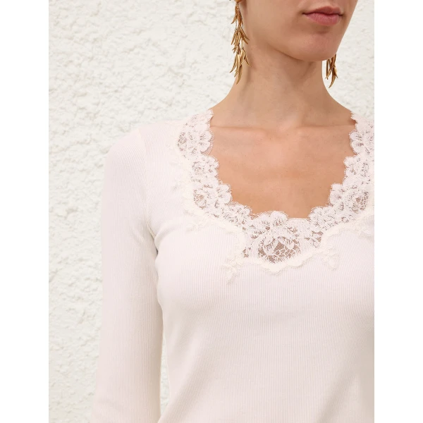 Elevate your elegance in this Zimmermann Tops available now at Luxury Shoes 