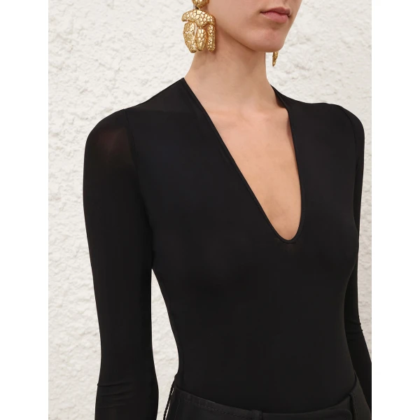 Elevate your elegance in this Zimmermann Tops available now at Luxury Shoes 