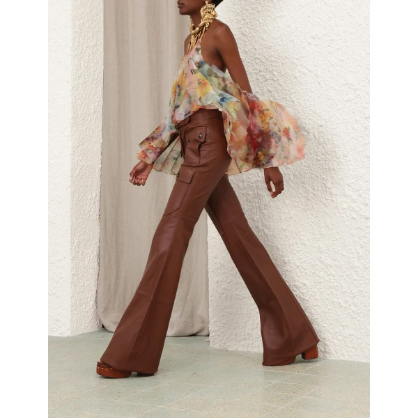 Elevate your elegance in this Zimmermann Tops available now at Luxury Shoes 