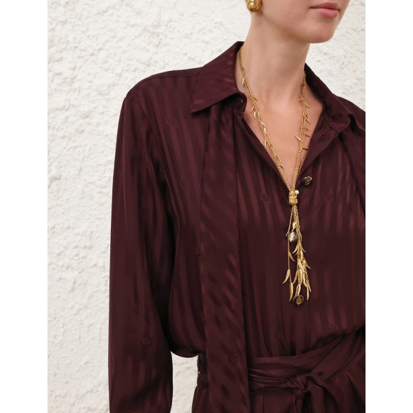 Elevate your elegance in this Zimmermann Tops available now at Luxury Shoes 