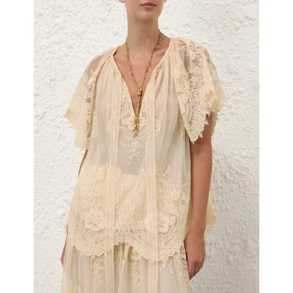 Elevate your elegance in this Zimmermann Tops available now at Luxury Shoes 