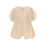 Zimmermann Luna Lace Flutter Blouse | Ready to Wear Collection Luxury Shoes Elevate your elegance in this Zimmermann Tops available now at Luxury Shoes