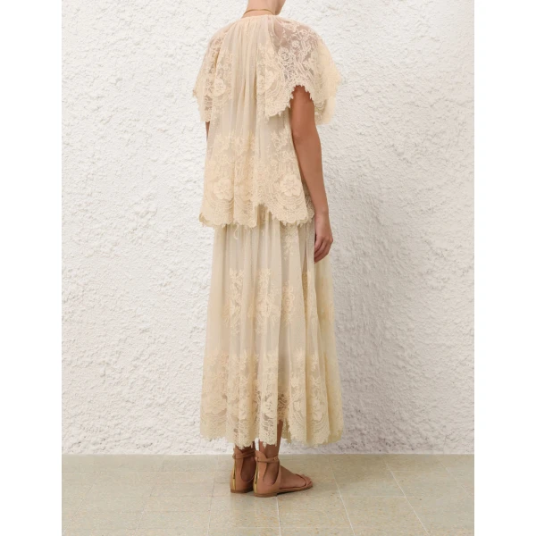 Elevate your elegance in this Zimmermann Tops available now at Luxury Shoes 