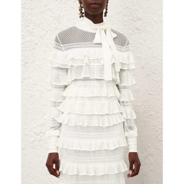Elevate your elegance in this Zimmermann Tops available now at Luxury Shoes 