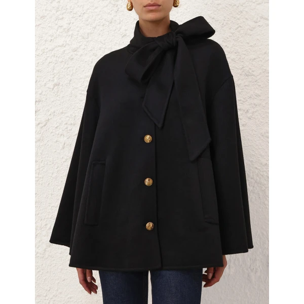Elevate your elegance in this Zimmermann Coats available now at Luxury Shoes 