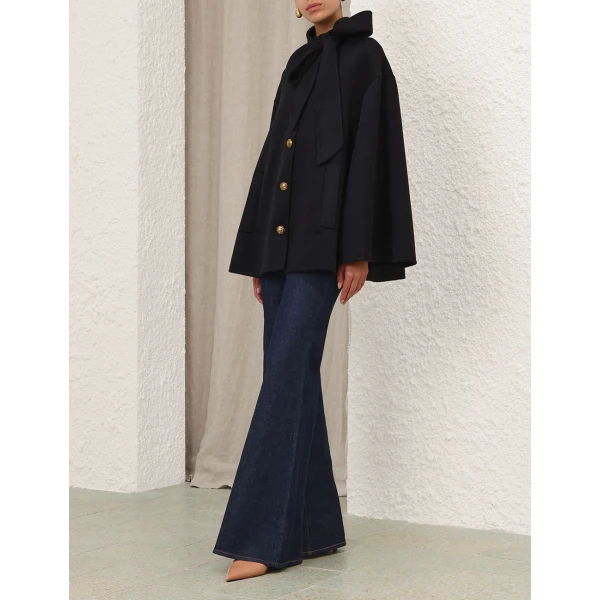 Elevate your elegance in this Zimmermann Coats available now at Luxury Shoes 
