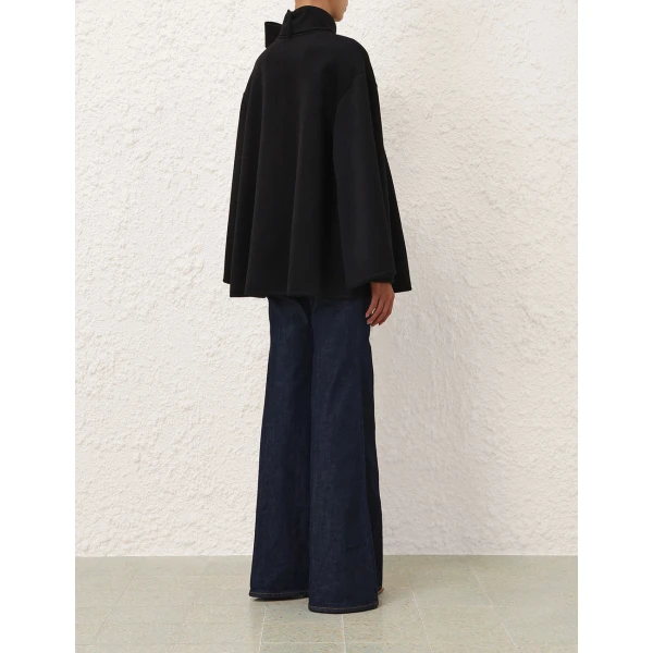 Elevate your elegance in this Zimmermann Coats available now at Luxury Shoes 