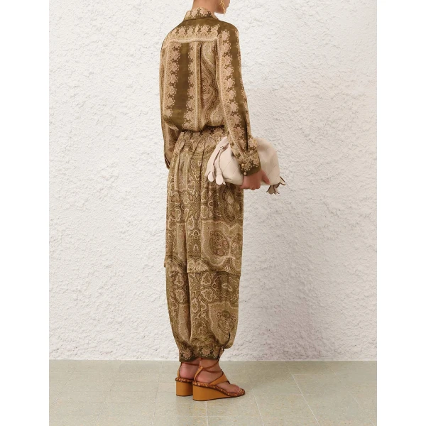 Elevate your elegance in this Zimmermann Tops available now at Luxury Shoes 