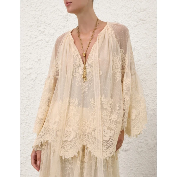 Elevate your elegance in this Zimmermann Tops available now at Luxury Shoes 