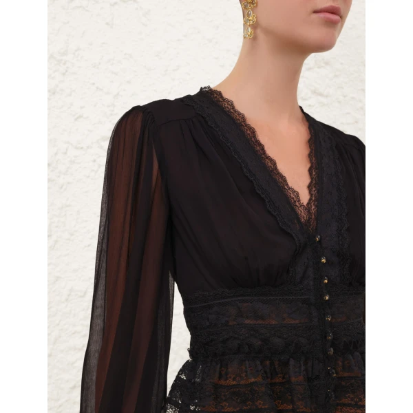 Elevate your elegance in this Zimmermann Tops available now at Luxury Shoes 