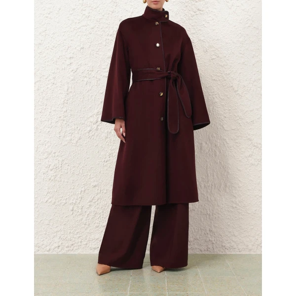Elevate your elegance in this Zimmermann Coats available now at Luxury Shoes 