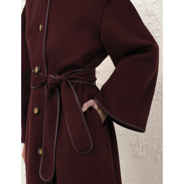 Elevate your elegance in this Zimmermann Coats available now at Luxury Shoes 