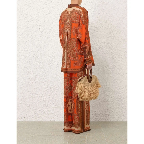 Elevate your elegance in this Zimmermann Tops available now at Luxury Shoes 
