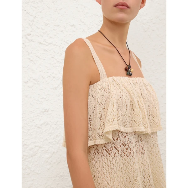 Elevate your elegance in this Zimmermann Tops available now at Luxury Shoes 
