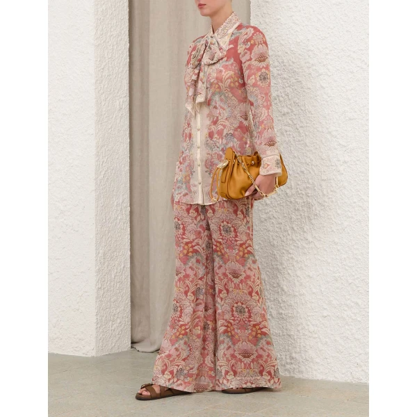 Elevate your elegance in this Zimmermann Tops available now at Luxury Shoes 
