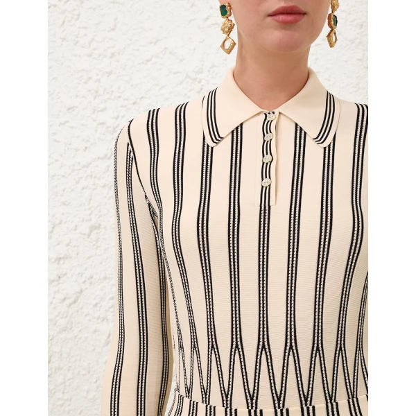 Elevate your elegance in this Zimmermann Tops available now at Luxury Shoes 