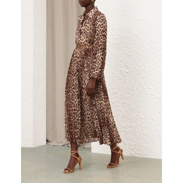 Elevate your elegance in this Zimmermann Tops available now at Luxury Shoes 