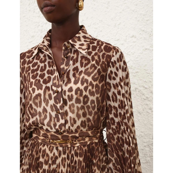 Elevate your elegance in this Zimmermann Tops available now at Luxury Shoes 