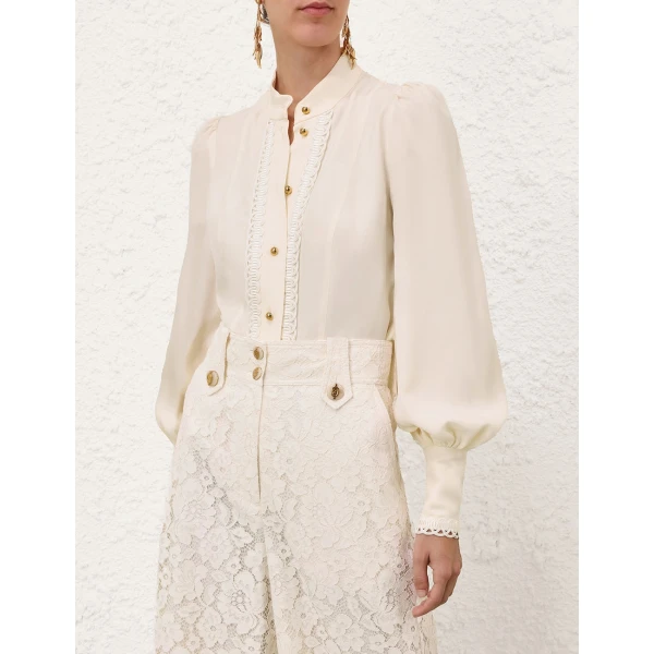 Elevate your elegance in this Zimmermann Tops available now at Luxury Shoes 