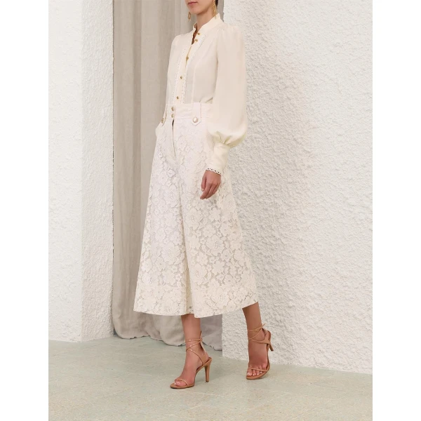Elevate your elegance in this Zimmermann Tops available now at Luxury Shoes 