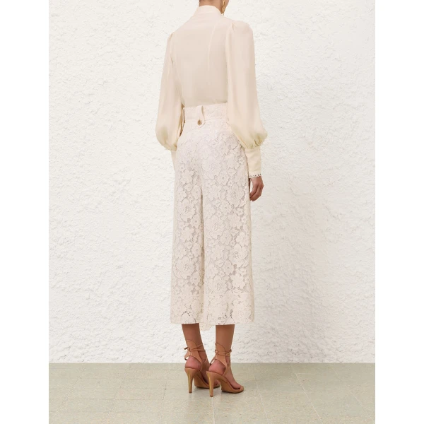 Elevate your elegance in this Zimmermann Tops available now at Luxury Shoes 