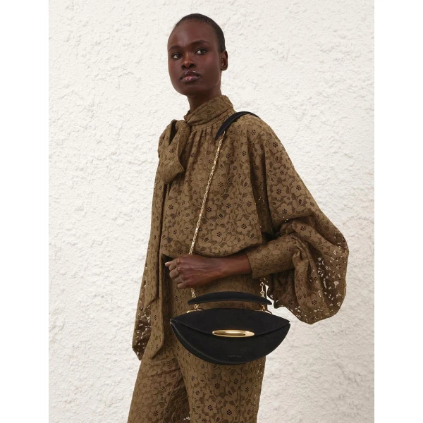 Elevate your elegance in this Zimmermann Tops available now at Luxury Shoes 
