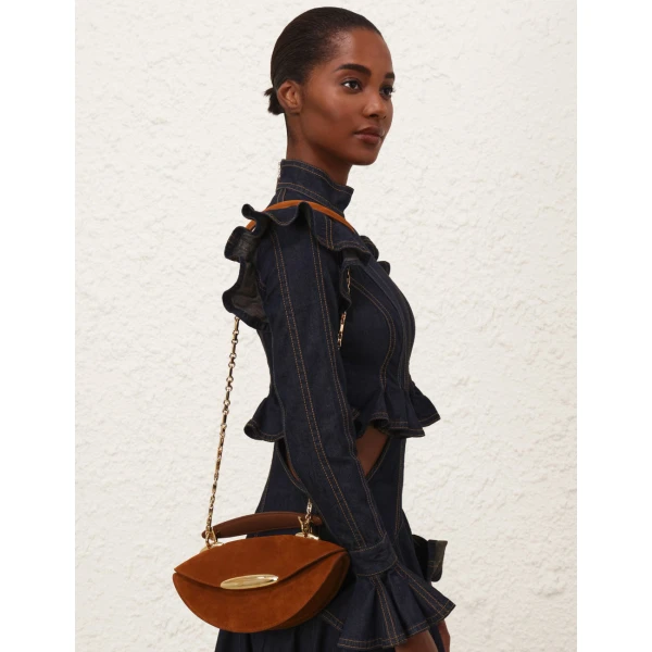 Elevate your elegance in this Zimmermann Tops available now at Luxury Shoes 