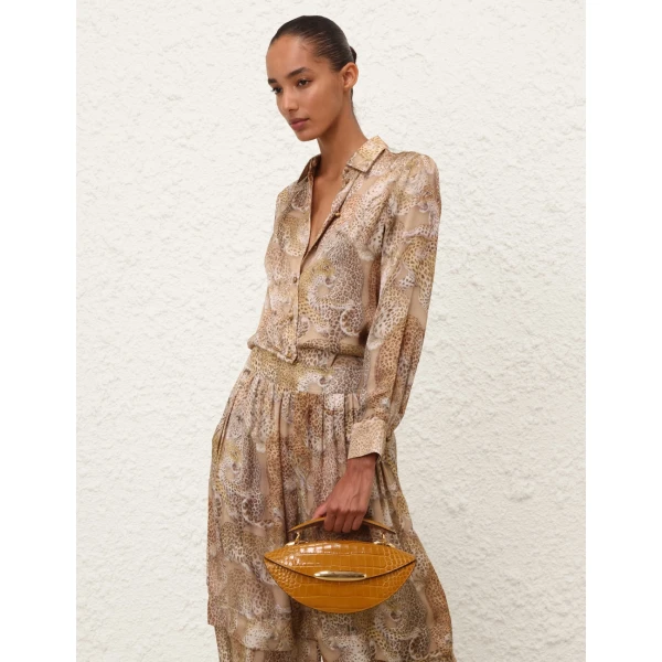 Elevate your elegance in this Zimmermann Tops available now at Luxury Shoes 
