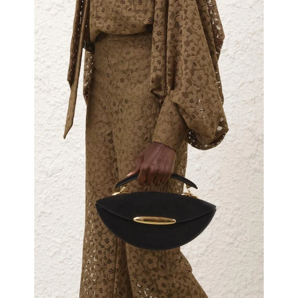 Elevate your elegance in this Zimmermann Tops available now at Luxury Shoes 