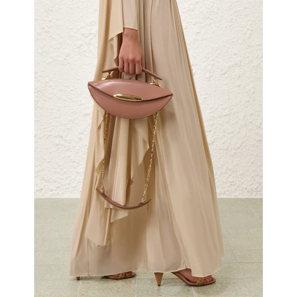 Elevate your elegance in this Zimmermann Tops available now at Luxury Shoes 