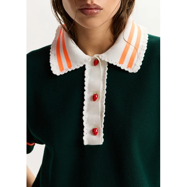 Essentiel Antwerp Dark green fine knit polo top with white and orange lace-trimmed collar and strawberry-shaped buttons, view 3