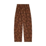 Ganni Trousers in Brown Fil Coupe